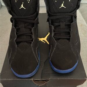Jordan Men's Black and Gold Sneakers with Blue Soles